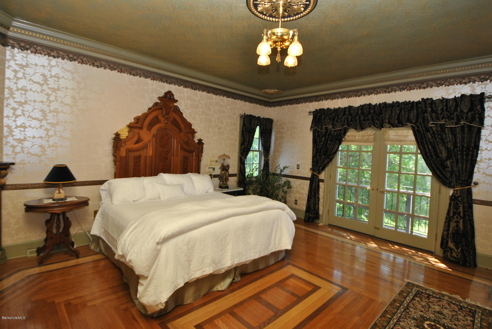 55 Maple Hill Road West Stockbridge, MA 01266 - Photo 40 of 63 a bed sitting in a room next to a window