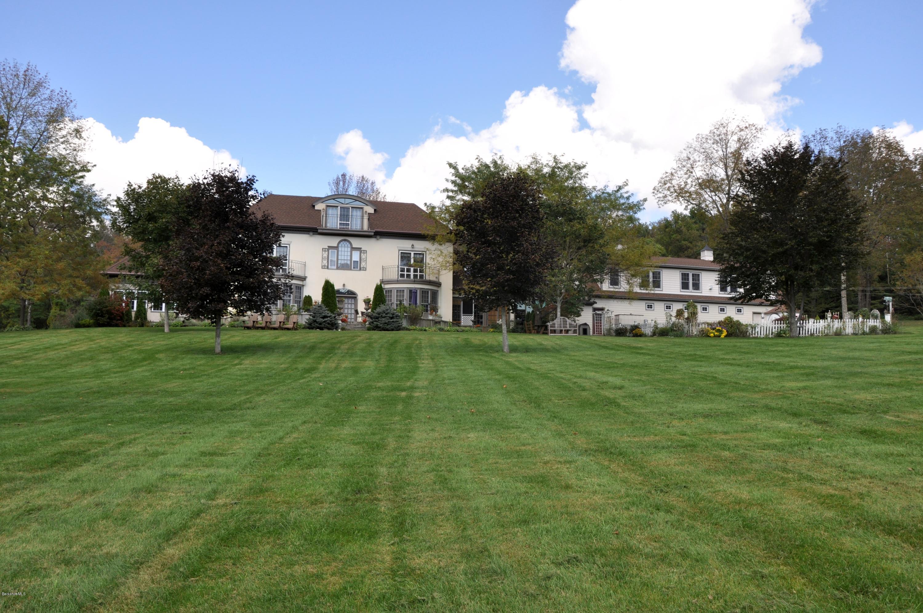 55 Maple Hill Road West Stockbridge, MA 01266 - Photo 5 of 63 a view of house with a big yard