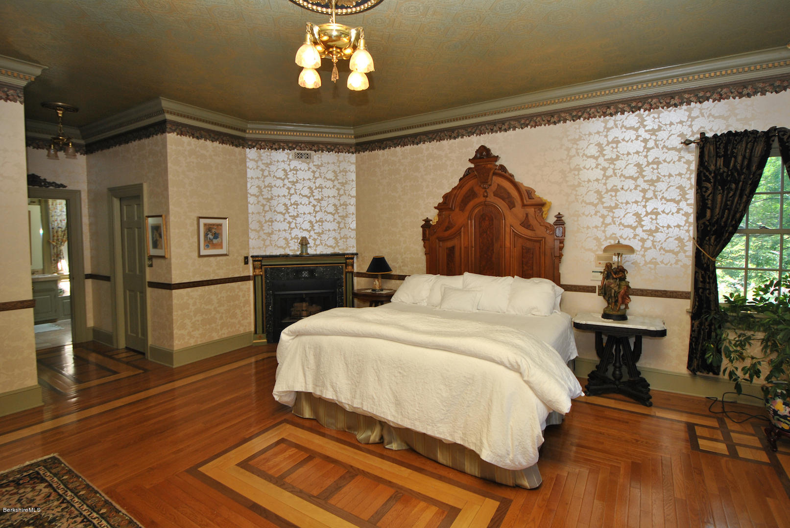 55 Maple Hill Road West Stockbridge, MA 01266 - Photo 41 of 63 a spacious bedroom with a bed dresser and a window