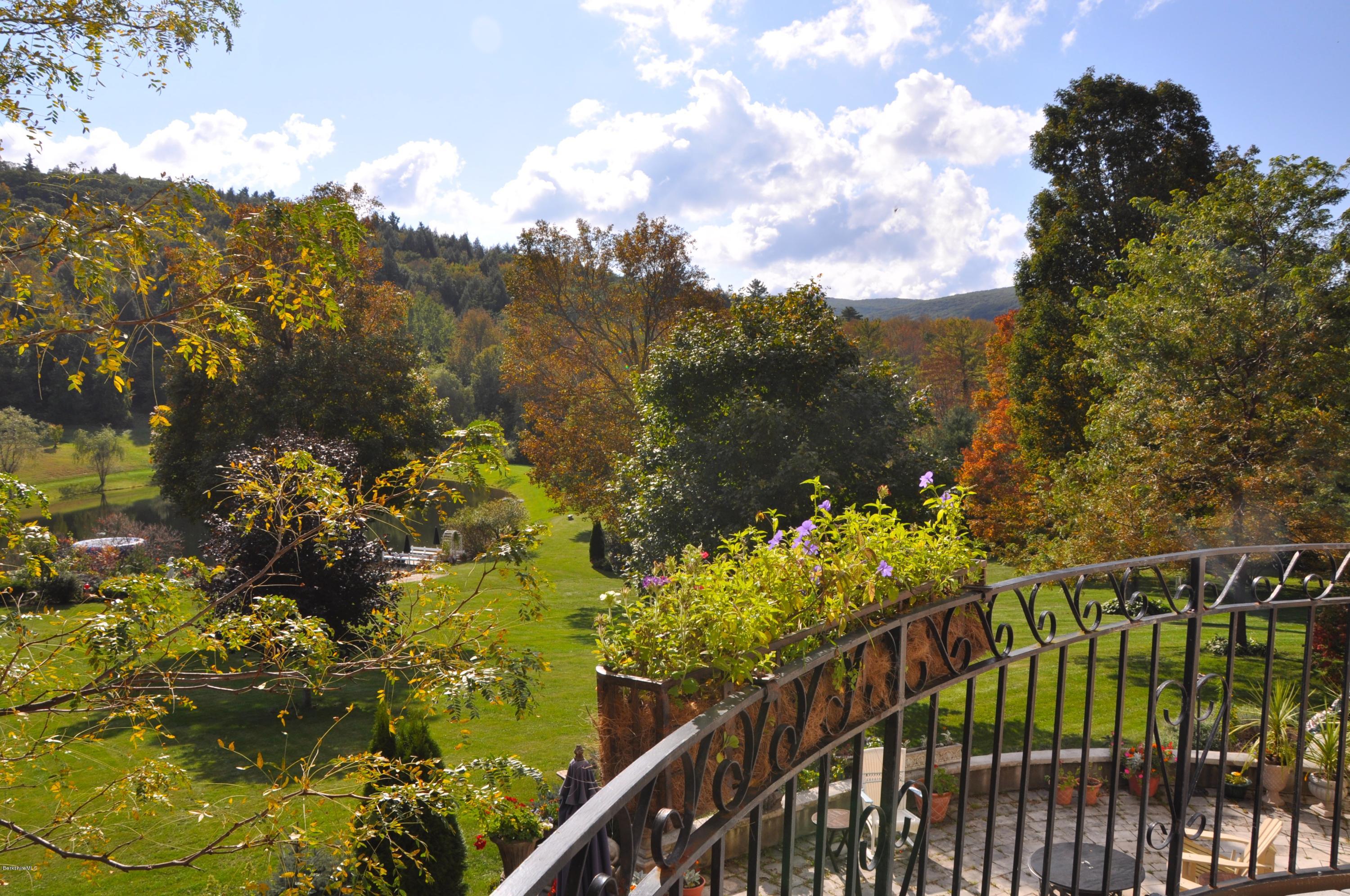 55 Maple Hill Road West Stockbridge, MA 01266 - Photo 44 of 63 a view of a lake from a balcony