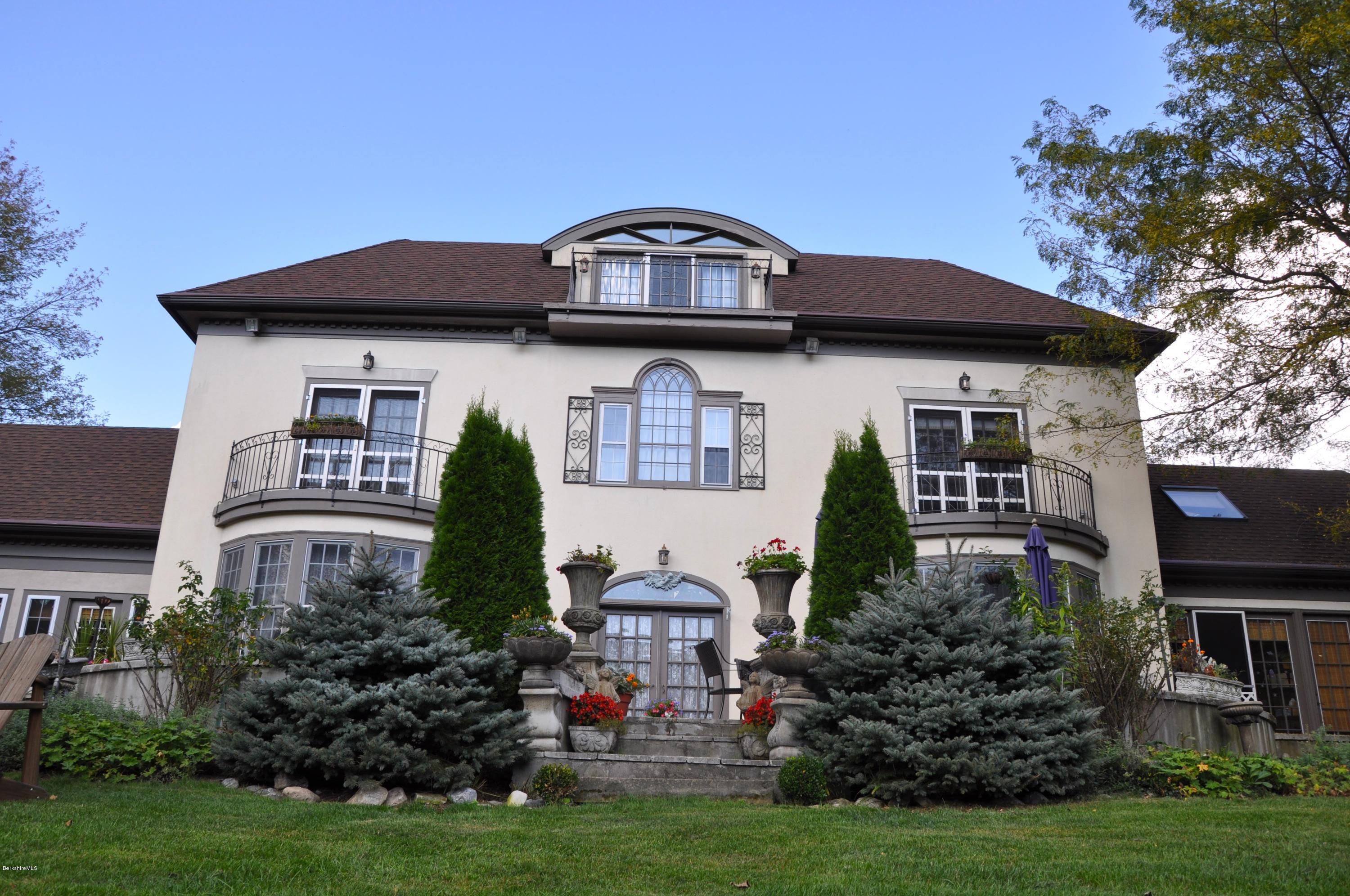 55 Maple Hill Road West Stockbridge, MA 01266 - Photo 57 of 63 a front view of a house with garden