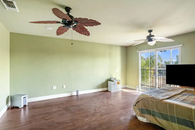a bathroom with a sink a mirror and a vanity