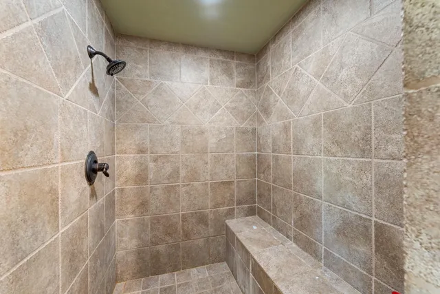 a view of a swimming pool with an outdoor seating