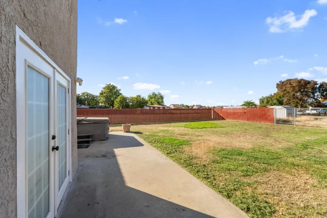 a view of a house with a park