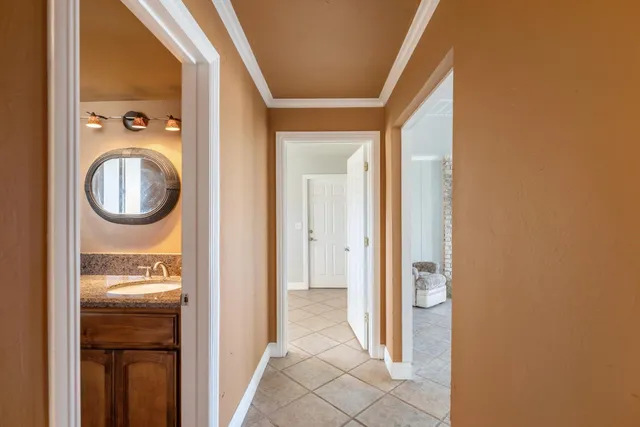 a view of a hallway with washer and dryer