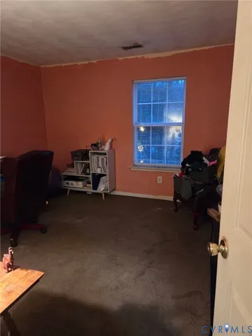 a room with furniture and a window