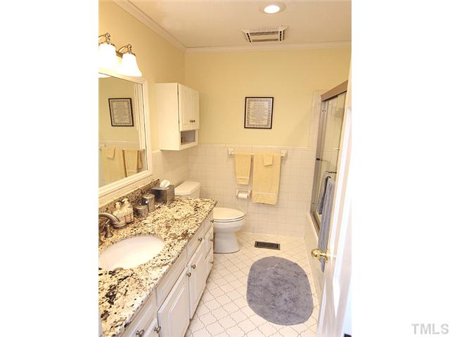 1608 Stonehurst Road Raleigh, NC 27607 - Photo 14 of 23 2nd floor guest bath - with new granite countertops.