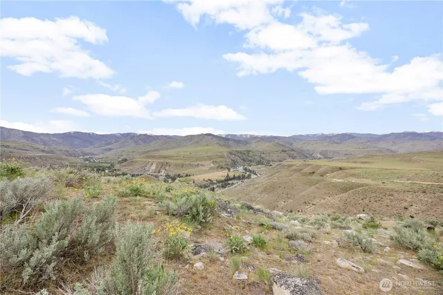 a view of lake with mountain