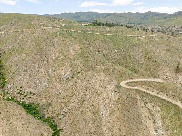a view of a lake with mountain