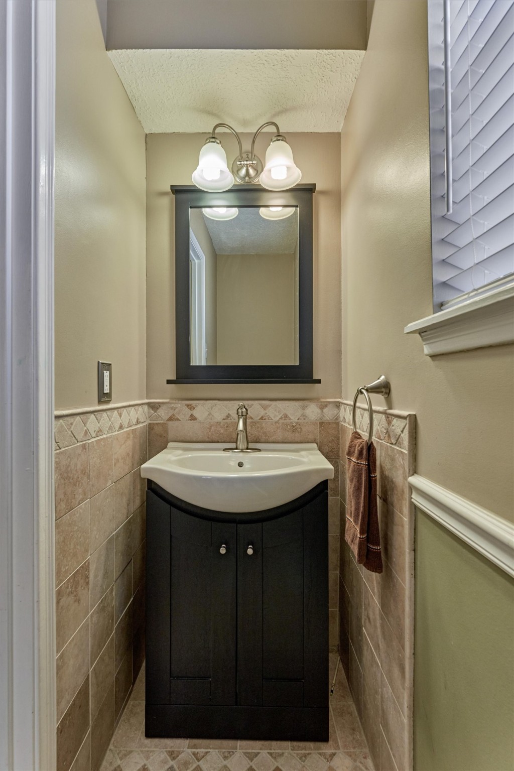 5503 Alamosa Lane Spring, TX 77379 - Photo 19 of 38 a bathroom with a sink and a mirror
