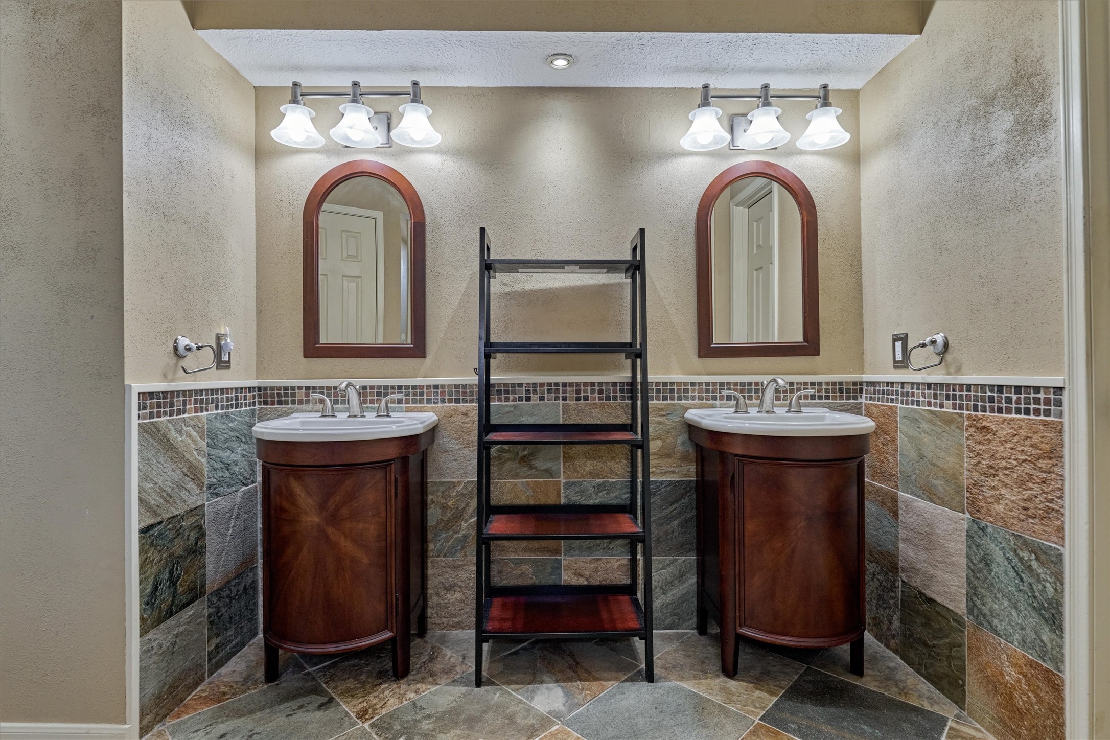 5503 Alamosa Lane Spring, TX 77379 - Photo 25 of 38 a bathroom with a sink and a mirror