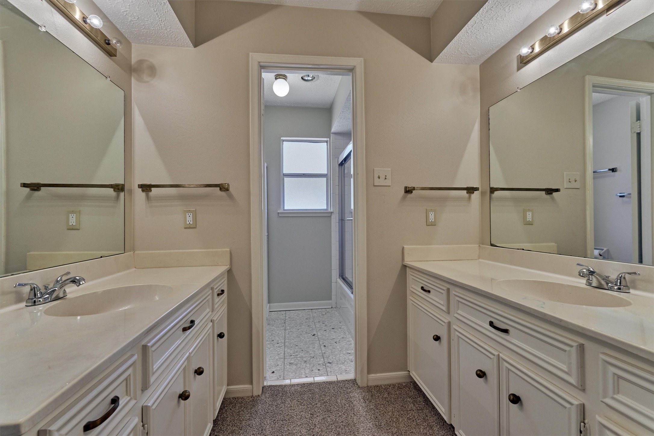 5503 Alamosa Lane Spring, TX 77379 - Photo 33 of 38 a bathroom with a double vanity sink mirror and