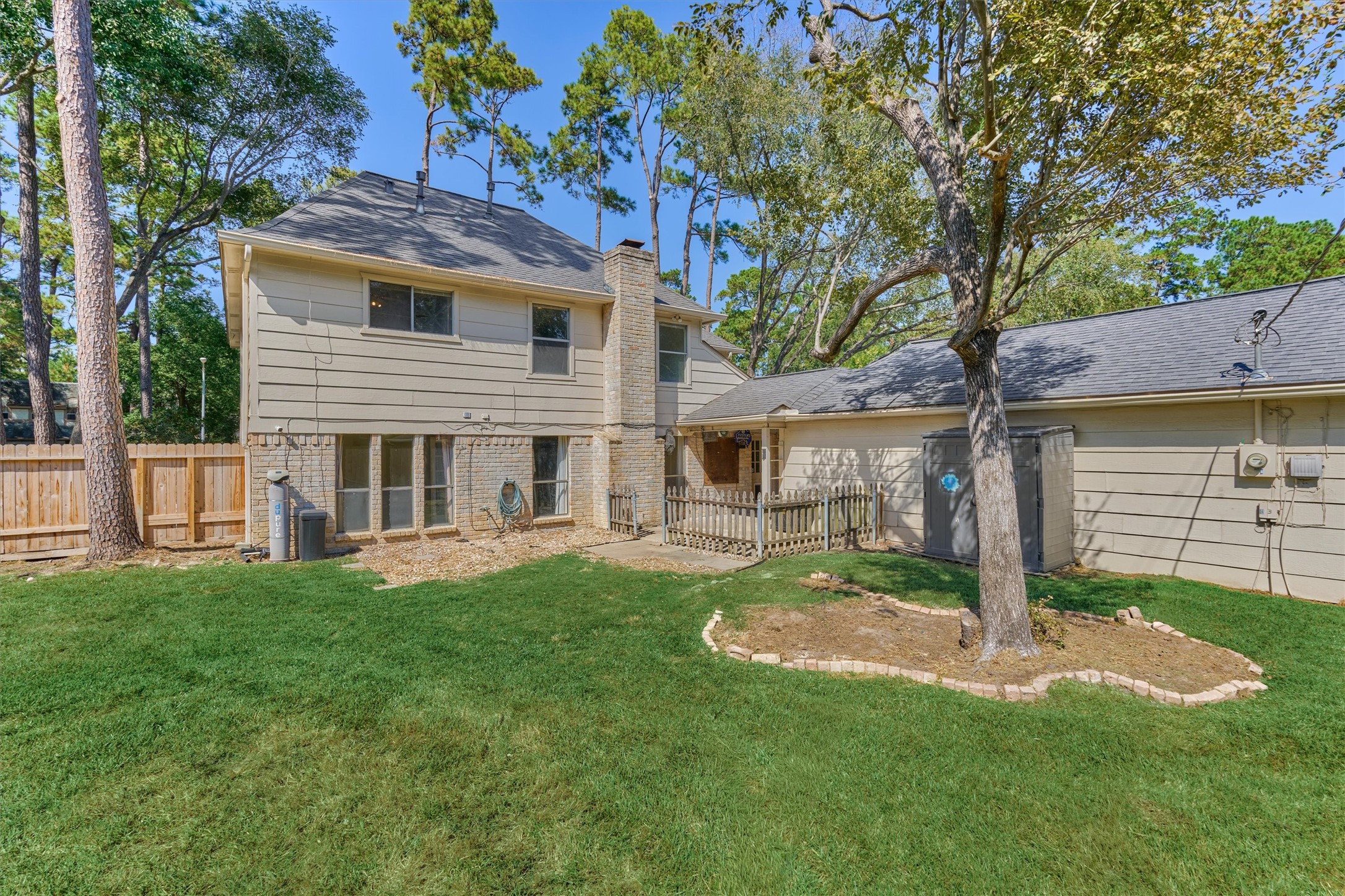 5503 Alamosa Lane Spring, TX 77379 - Photo 5 of 38 a view of a house with a yard and sitting area