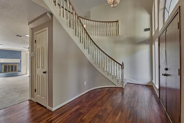 a view of entryway with wooden floor