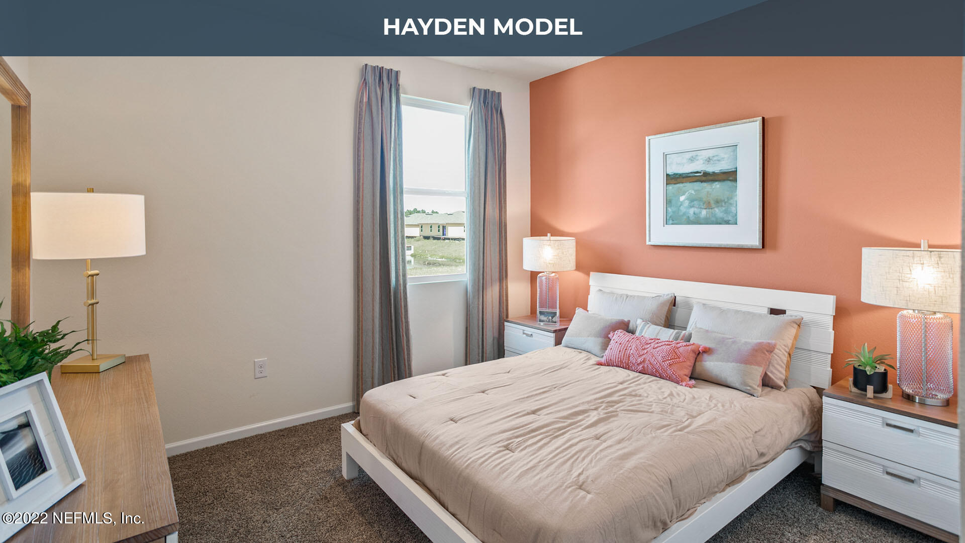 12648 European Beech Road Jacksonville, FL 32218 - Photo 10 of 37 a bedroom with a bed and a chair