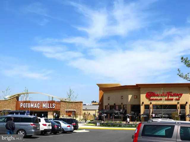 a view of a cars parked in front of a building