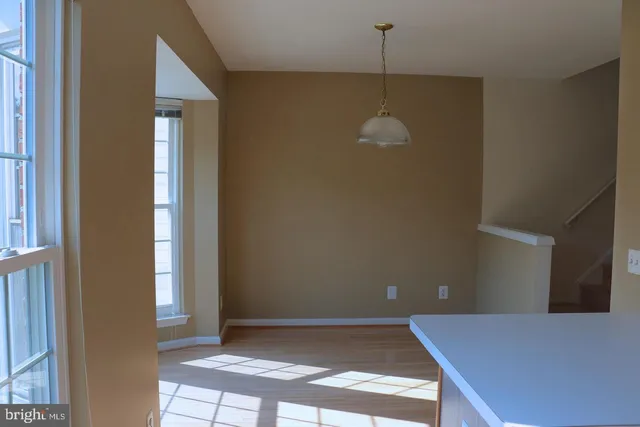 a view of a hallway with an empty space