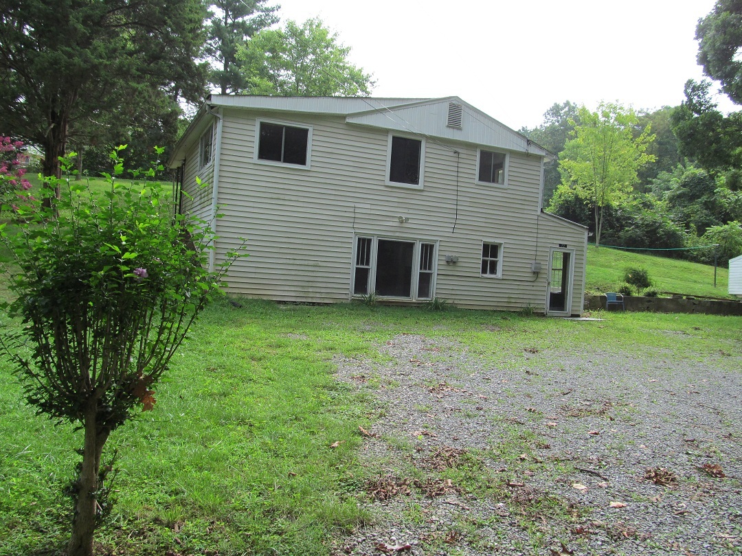 72 Clemons Road Roanoke, VA 24019 - Photo 1 of 15 a view of a house with a backyard