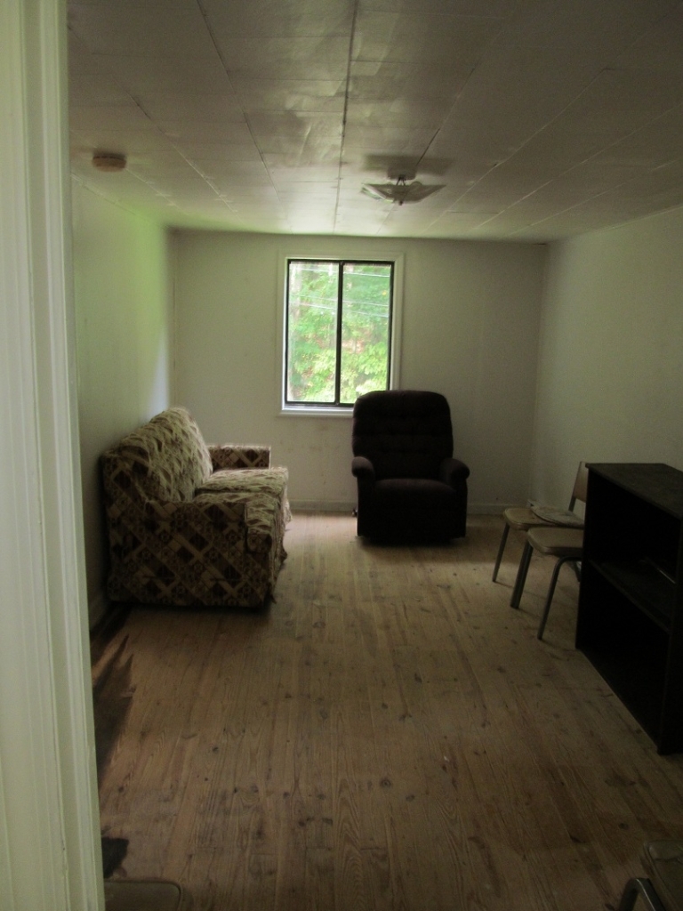72 Clemons Road Roanoke, VA 24019 - Photo 4 of 15 a living room with furniture and a window