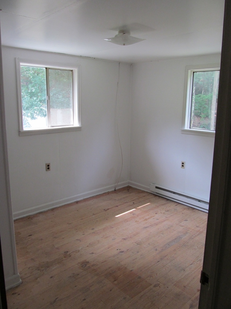72 Clemons Road Roanoke, VA 24019 - Photo 5 of 15 an empty room with windows