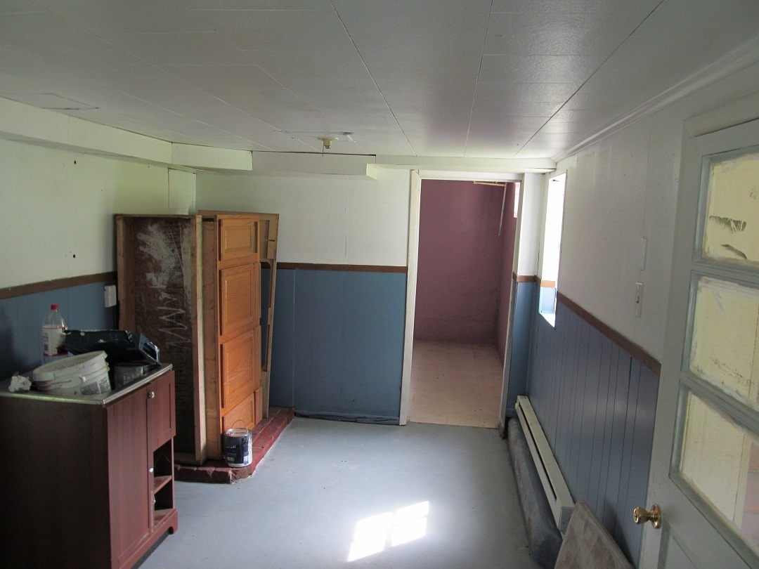 72 Clemons Road Roanoke, VA 24019 - Photo 7 of 15 a kitchen with refrigerator and window