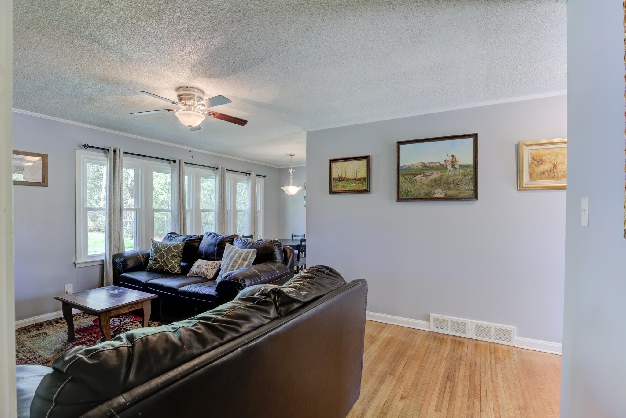 1421 Flamingo Road Memphis, TN 38117 - Photo 11 of 23 a living room with furniture and wooden floor