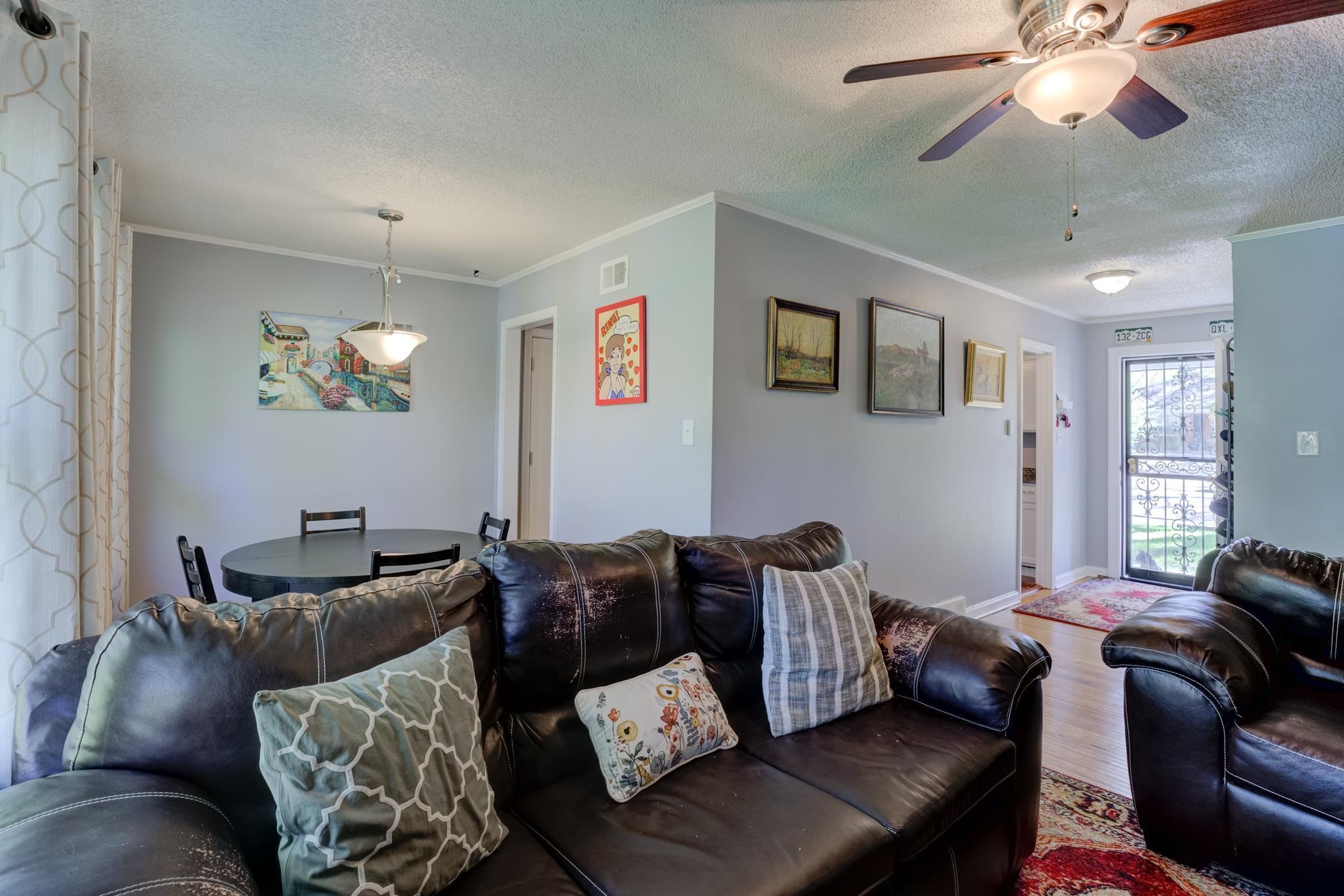 1421 Flamingo Road Memphis, TN 38117 - Photo 7 of 23 a living room with furniture and a window