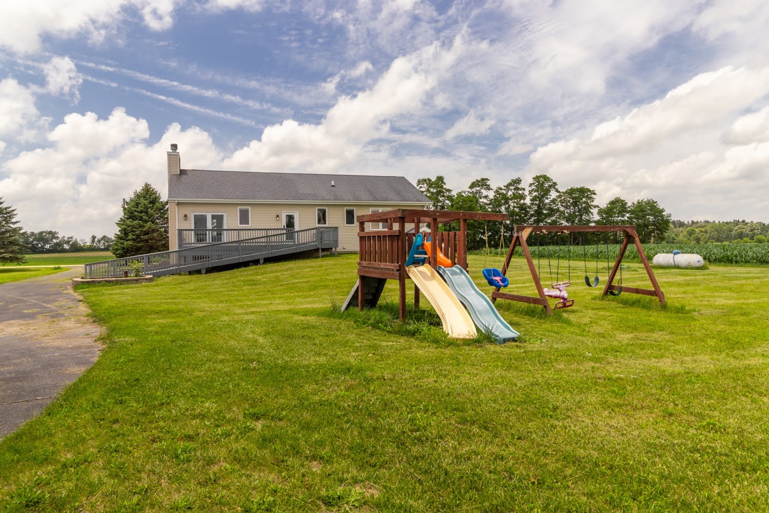 16649 Beaverton Road Capron, IL 61012 - Photo 35 of 48 a view of a house with swimming pool and a yard