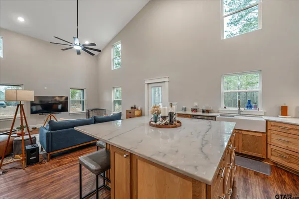 a kitchen with a sink and a stove