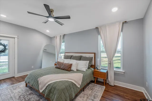 a bed room with a bed and a window