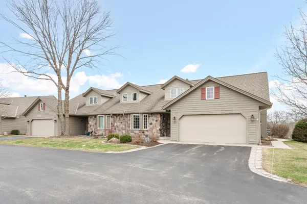 $550,000 | 203 Deer Ridge Drive, West Bend, WI 53095