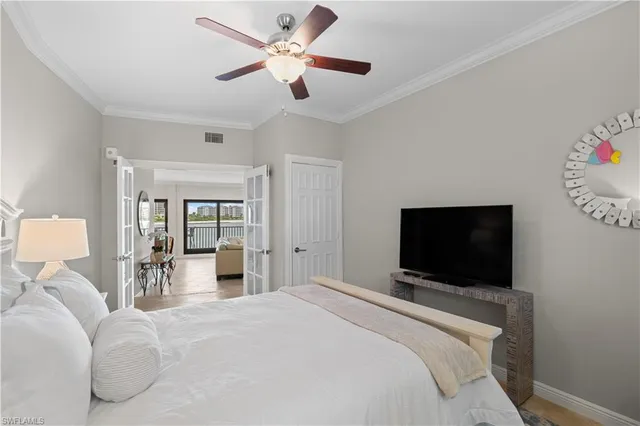 a bathroom with a double vanity sink mirror and toilet