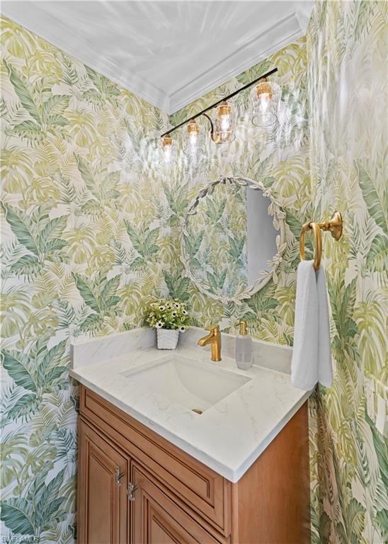 524 La Peninsula Boulevard, Unit 524 Naples, FL 34113 - Photo 7 of 44 a view of bathroom sink