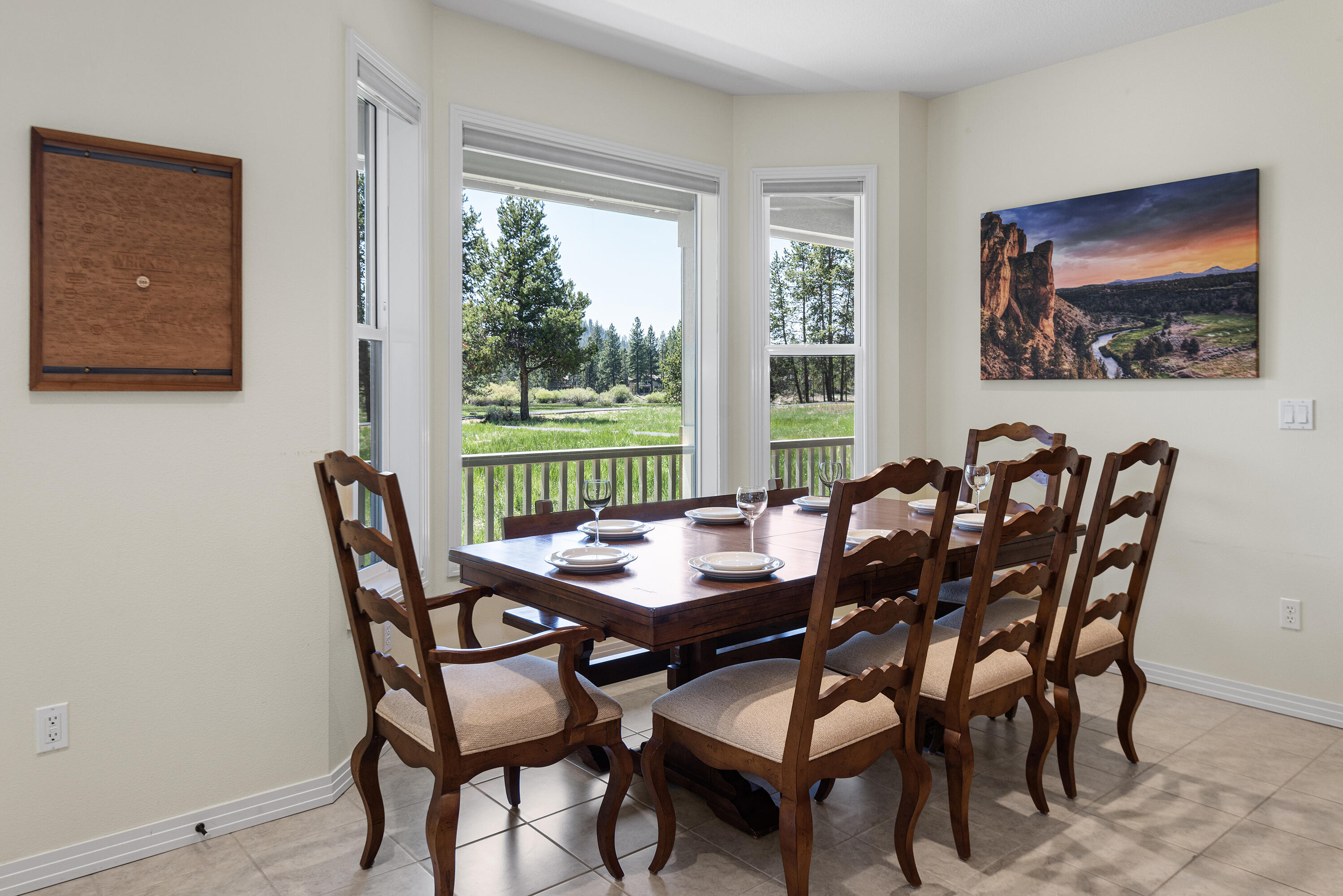 16775 Pony Express Way Bend, OR 97707 - Photo 9 of 38 a view of a dining room with furniture window and outside view