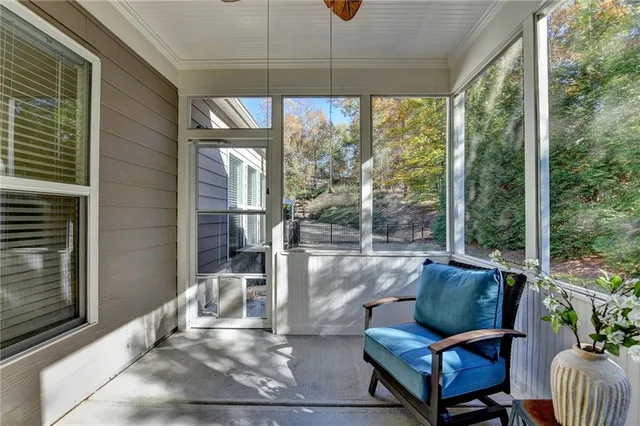a outdoor living space with furniture and a potted plant