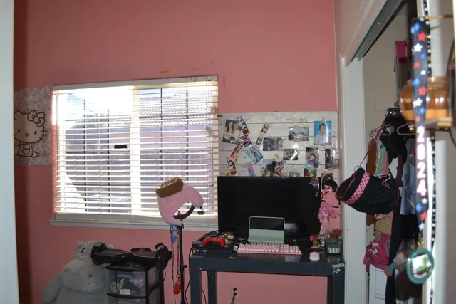 a bathroom with a sink toilet and mirror