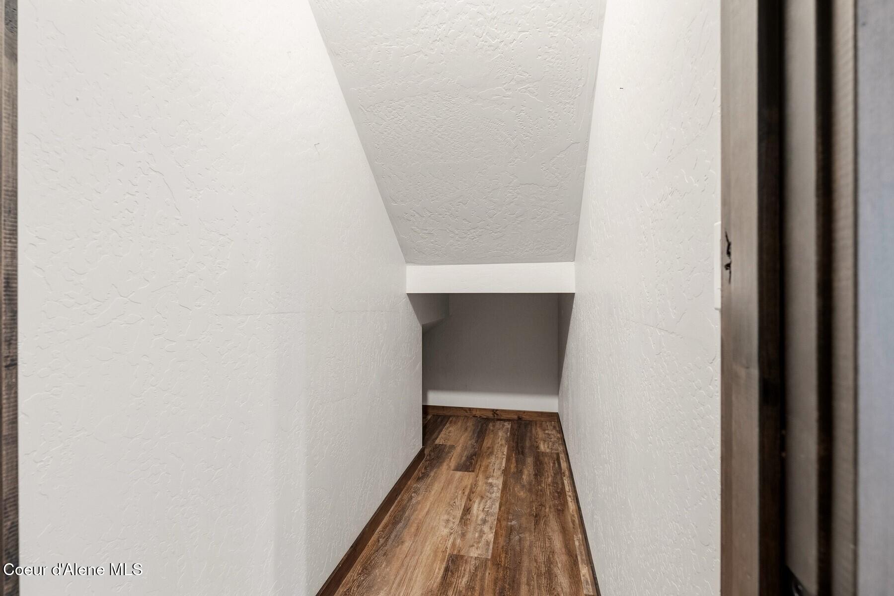 1317 Prominence Court Sandpoint, ID 83864 - Photo 28 of 44 Hallway Under Stairs Storage