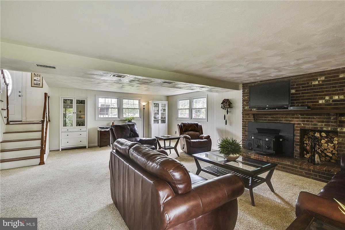 4003 Middle Ridge Drive Fairfax, VA 22033 - Photo 21 of 30 Read by the Wood Stove and watch the snow fall!