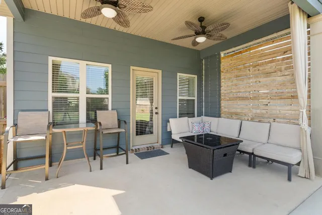 a view of a park with plants and a bench