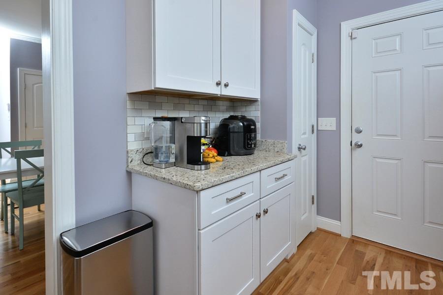41 South Old Lantern Road Timberlake, NC 27583 - Photo 10 of 25 a kitchen with white cabinets and sink