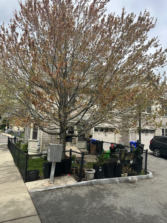 2856 Washington Street Boston, MA 02119 - Photo 4 of 39 a view of a street with sitting area