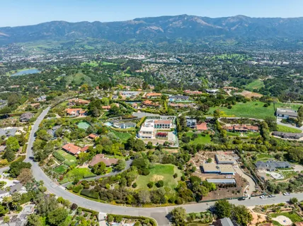 an aerial view of residential house and outdoor space
