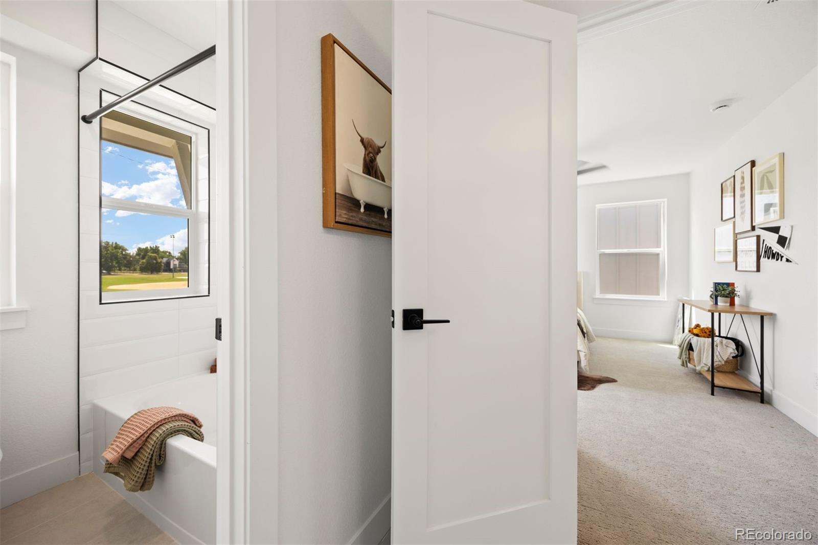4000 Upham Street Wheat Ridge, CO 80033 - Photo 35 of 50 a view of a livingroom with furniture and windows