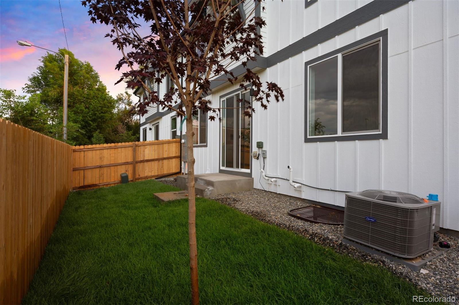 4000 Upham Street Wheat Ridge, CO 80033 - Photo 45 of 50 a backyard of a house with lots of green space