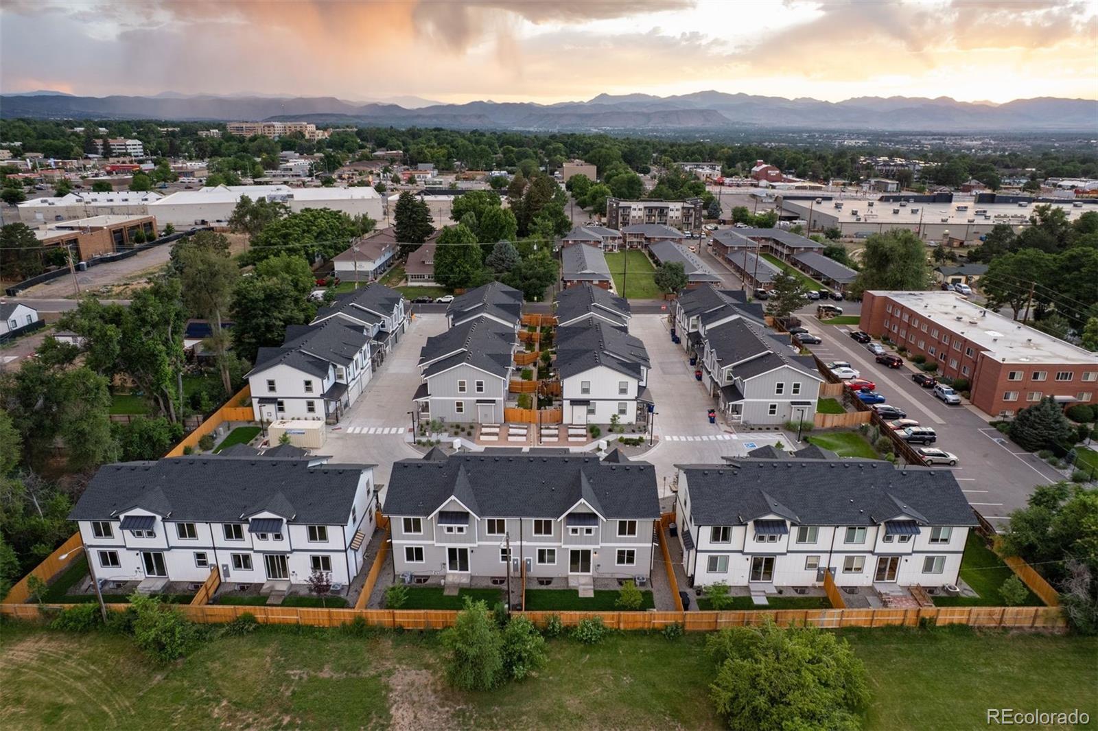 4000 Upham Street Wheat Ridge, CO 80033 - Photo 46 of 50 a view of a city with lots of residential buildings ocean and mountain view in back