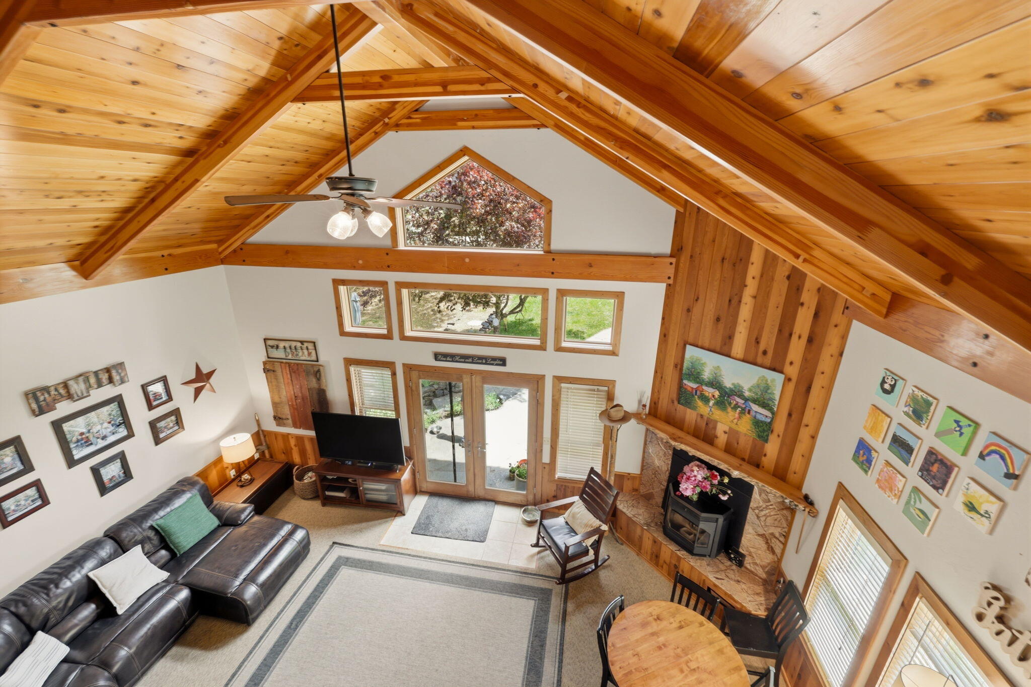985 Elliott Creek Road Wilderville, OR 97543 - Photo 70 of 98 a living room with furniture and a fireplace