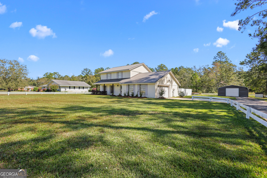168 Pierce Street Jesup, GA 31545 - Photo 2 of 30 a view of a house with a big yard