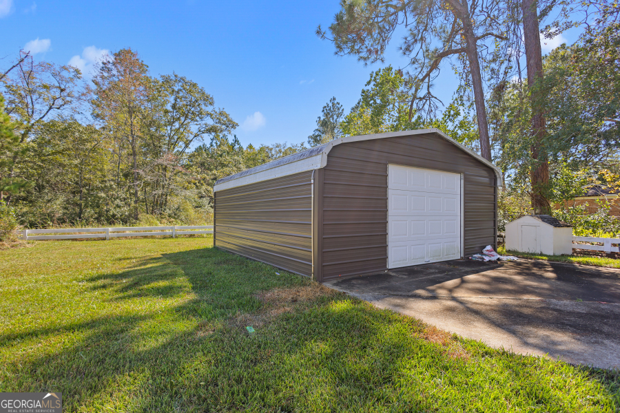168 Pierce Street Jesup, GA 31545 - Photo 29 of 30 a view of a house with a yard