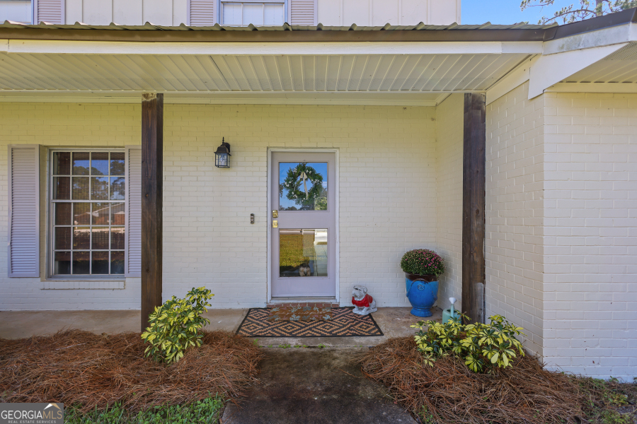 168 Pierce Street Jesup, GA 31545 - Photo 6 of 30 a front view of a house with a yard