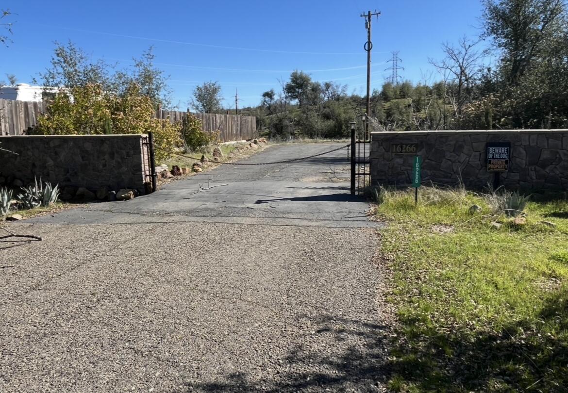 16266 Gold Pan Way Redding, CA 96001 - Photo 3 of 9 a view of a backyard